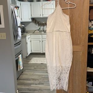 Brand new with tags white VICI collection dress. Size large and never worn.